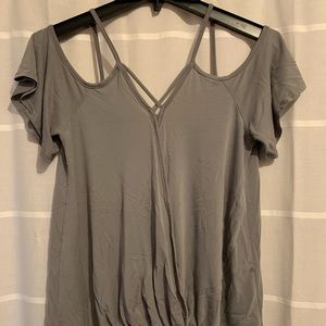 Exposed shoulder flowy top